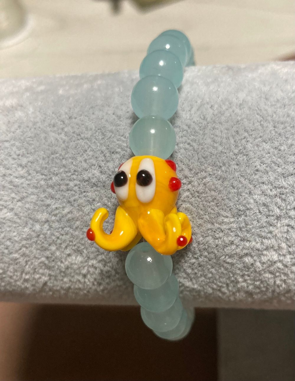 Charm bracelet - octopus, yellow, lampwork glass, stretchy