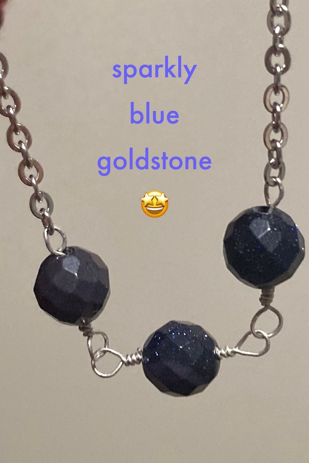 Wire wrapped bead necklace - blue goldstone