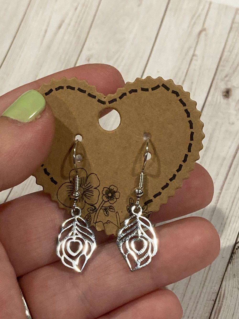 Peacock feather dangle earrings